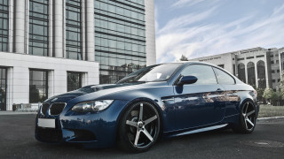 Blue car building sky clouds - a blue car free wallpaper