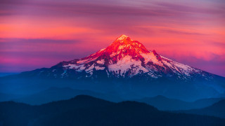 Mountain sunset pink clouds mystical - peak in the background free wallpaper