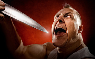 Man knife screaming red background - his right hand free wallpaper