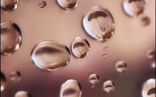 Water droplets glass pink bokeh - a black border free wallpaper for desktop