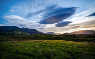 Grassy field mountains sunset clouds - white cloud free wallpaper for desktop