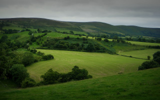 Green valley hills trees cloudy - free landscape wallpaper