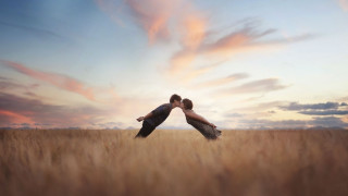 Couple kissing field sunset clouds - tall grass free wallpaper for desktop