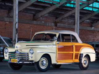 Classic car garage brick wall - a classic car free wallpaper