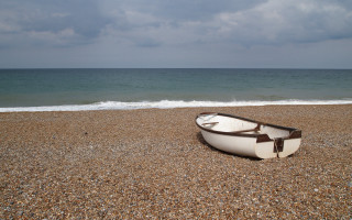 Boat beach cloudy sky ocean - the ocean in the background free wallpaper for desktop