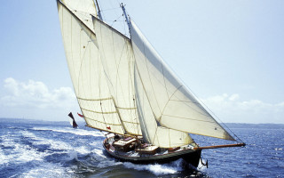 Sailboat water blue sky clouds 2 - flemish free wallpaper