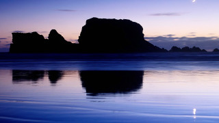 Rock formation sunset moon clouds - a rock formation free wallpaper