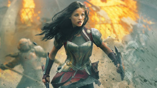 Woman running fire armor explosion - area free wallpaper