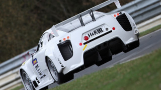 White racecar racetrack trees grass - hard edge free wallpaper