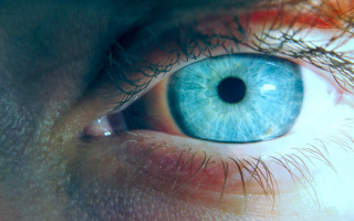 Eye blue iris macro fireworks - a close up of a persons eye free wallpaper