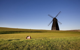Windmill field person tiltshift sunset 2 - derek hill free wallpaper