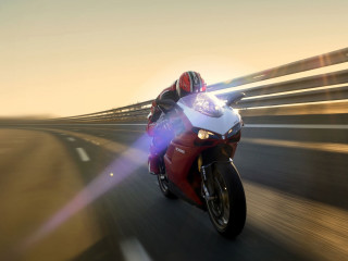 Motorcycle rider highway brightlight blurrybackground - a highway free wallpaper