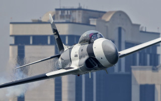 Fighter jet smoke building motion - cleve gray free wallpaper