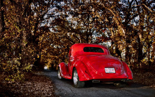 Red car parked woods person - kodachrome free wallpaper