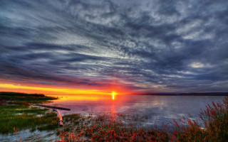 Sunset water boat clouds hudson - a sunset over a body of water free wallpaper
