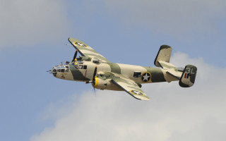 Small plane cloudy sky propeller - side and a propeller free wallpaper