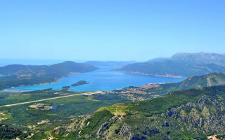 Mountain lake town panorama nature - avgust černigoj free wallpaper