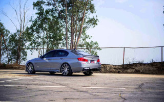 Silver car fence trees branch - a silver car free wallpaper