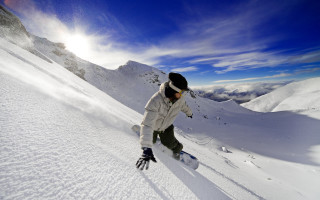 Snowboarder mountains sky clouds winter 2 - a snowboard free wallpaper