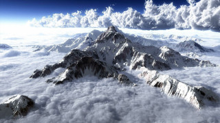 Mountain range snow clouds blue 2 - under a blue sky free wallpaper