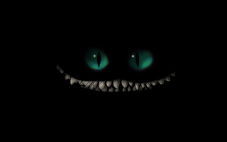 Black background green eyes smile 2 - darkness free wallpaper