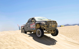 Desert truck man sand dunes - a truck free wallpaper
