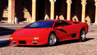 Red sports car building columns - column free wallpaper