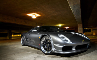 Silver sports car parking garage 5 - a parking garage free wallpaper for desktop