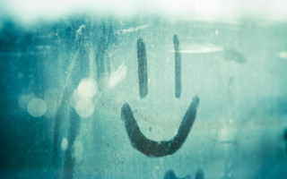 Smiley rainy window blue sky - a smiley face free wallpaper