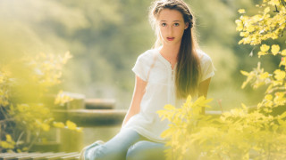 Woman bench park yellowflowers greentree - a bench in a park free wallpaper