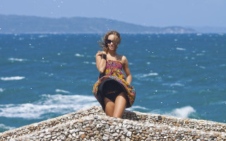 Woman ocean rock hat sunglasses - anna hotchkis free wallpaper