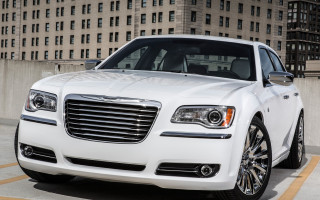 White car parking lot tokyo - a tall building free wallpaper