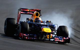 Red bull racing car smoke - a red bull free wallpaper