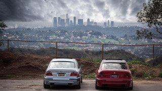 Parking cars city fence clouds - two car free wallpaper