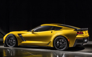 Yellow sports car dark room 9 - a black background and a spotlight free wallpaper