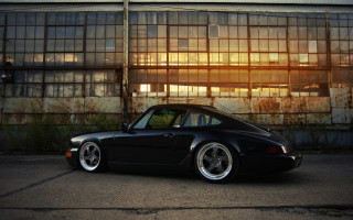 Black porsche building rusty wall - rusty free wallpaper