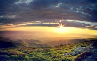 Sunset mountain valley clouds light - a beautiful sunset over a mountain range free wallpaper