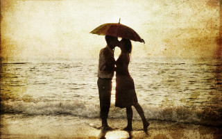 Romantic beach couple umbrella sunset - sunrise time free wallpaper