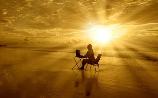 Beach sunset person sitting chair - cyril rolando free wallpaper