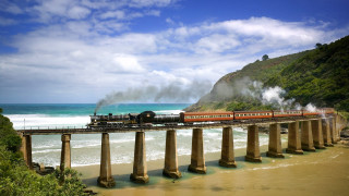 Train bridge ocean waves mountain - a train free wallpaper