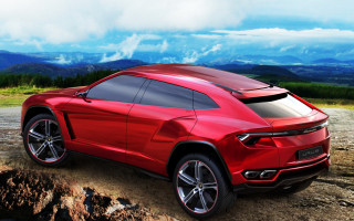 Red sports car mountains clouds 6 - a rocky hillside free wallpaper