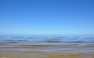 Ocean shore beach blue sky - a view of the ocean free wallpaper