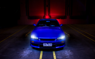 Blue car night red headlight - a blue car free wallpaper