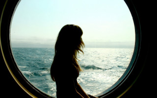 Woman ocean boat sunlight beach - the waters edge free wallpaper