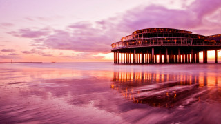 Pier building sunset reflection cityscape - a reflection of the water free wallpaper