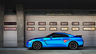 Blue sports car garage door - a garage door free wallpaper