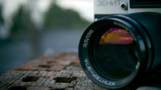 Camera lens wooden table sky - a sky in the background free wallpaper