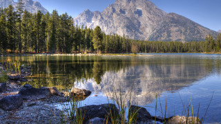 Mountain lake reflection trees rocks 2 - a clear blue sky free wallpaper