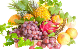 Basket fruit leaves grapes peaches - a basket of fruit free wallpaper