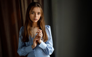 Woman blue shirt serious portrait - a blue shirt free wallpaper